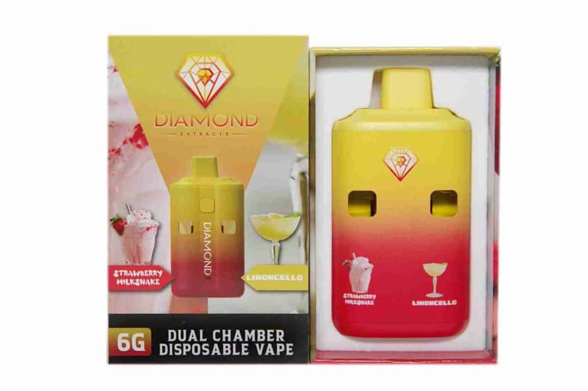 IMG_1481 Vape device with yellow and red gradient design featuring Diamond Extracts branding for cannabis concentrates and pre-filled cartridges.