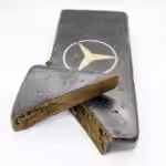 High-quality cannabis block with Mercedes-Benz logo, perfect for cannabis enthusiasts seeking top-tier product and unique packaging.