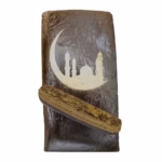 Decorative stone featuring a crescent moon and mosque silhouette, ideal for home decor or spiritual symbols reflecting Islamic culture.