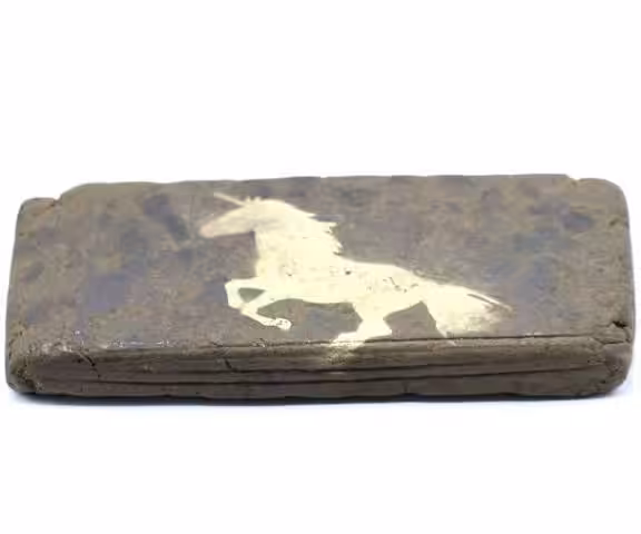 A vintage wooden package with a white horse silhouette design. Perfect for cannabis storage or collectible display, emphasizing quality and tradition in Canadian cannabis culture.