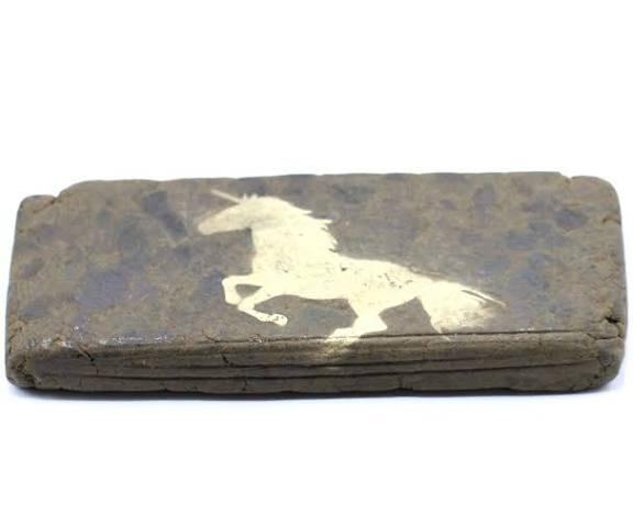 A vintage wooden package with a white horse silhouette design. Perfect for cannabis storage or collectible display, emphasizing quality and tradition in Canadian cannabis culture.