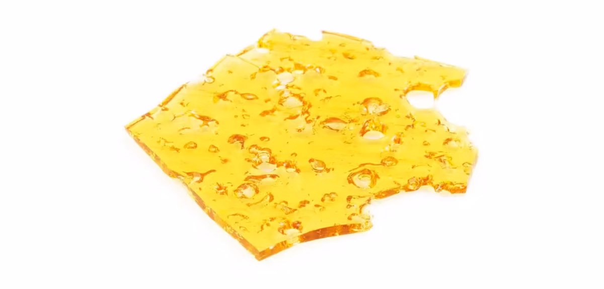 Pure cannabis honeycomb hash, premium THC product from Great Canadian Buds, featuring a golden, sticky, and aromatic appearance ideal for discerning consumers.