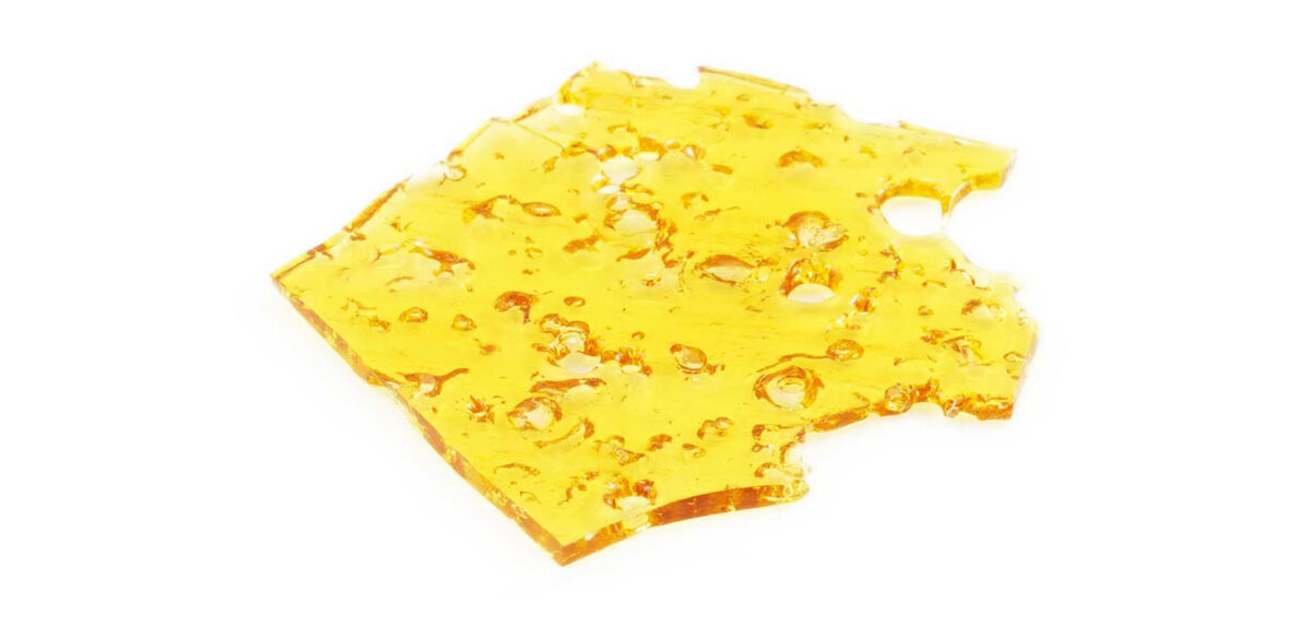 Pure cannabis honeycomb hash, premium THC product from Great Canadian Buds, featuring a golden, sticky, and aromatic appearance ideal for discerning consumers.