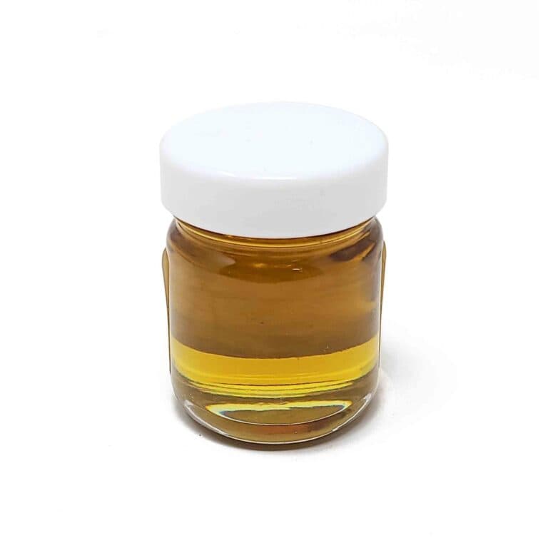 High-quality CBD oil bottle on white background, premium cannabis extract, natural CBD supplement for anxiety and pain relief, infused with cannabinoids, made by Great Canadian Buds.