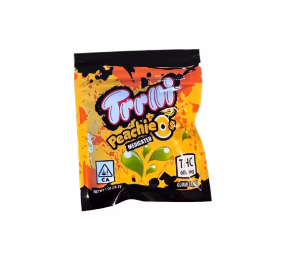 Bright yellow and orange cannabis-infused gummy candy package with tropical design and THC info.